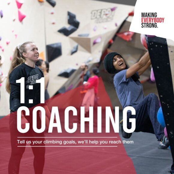 a female coach looks on as a female participant smiles broadly during an adult coaching session