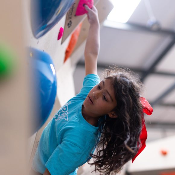 young girl climbing in leeds