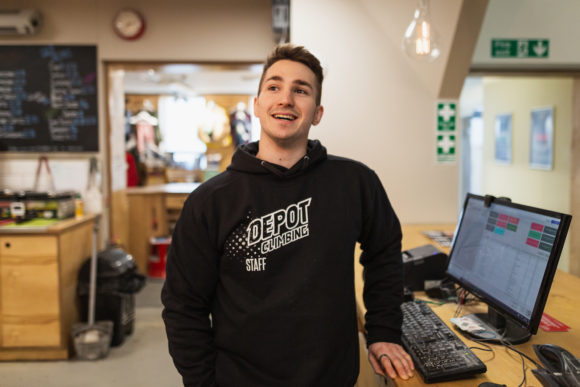 staff member answering common climbing questions