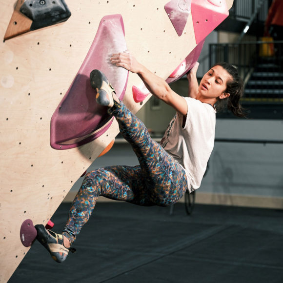 female climber making the most of our unlimited climbing passes