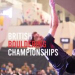 toby roberts competes on an overhang at the british bouldering championships