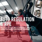 Andy McVittie (Process Physiotherapy) enthusiastically demonstrates the Y movement of an IYT TRX exercise with a participant learning how not to train using the rpe (rate of perceived exertion) scale.